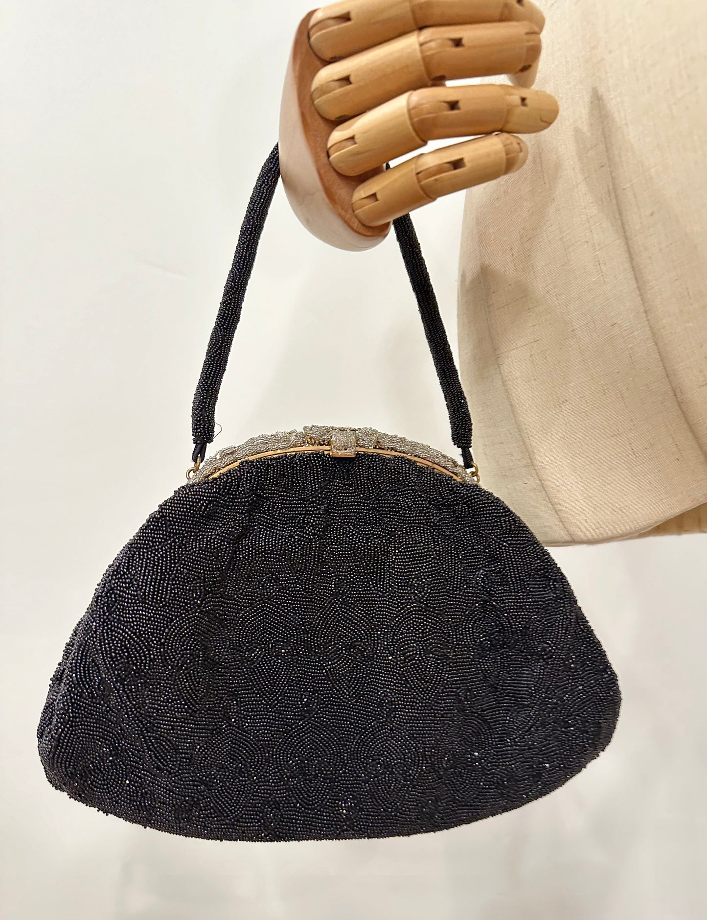 Le Gout du Jour Paris Black Beaded Handbag with Rhinestone Encrusted Enclosure.