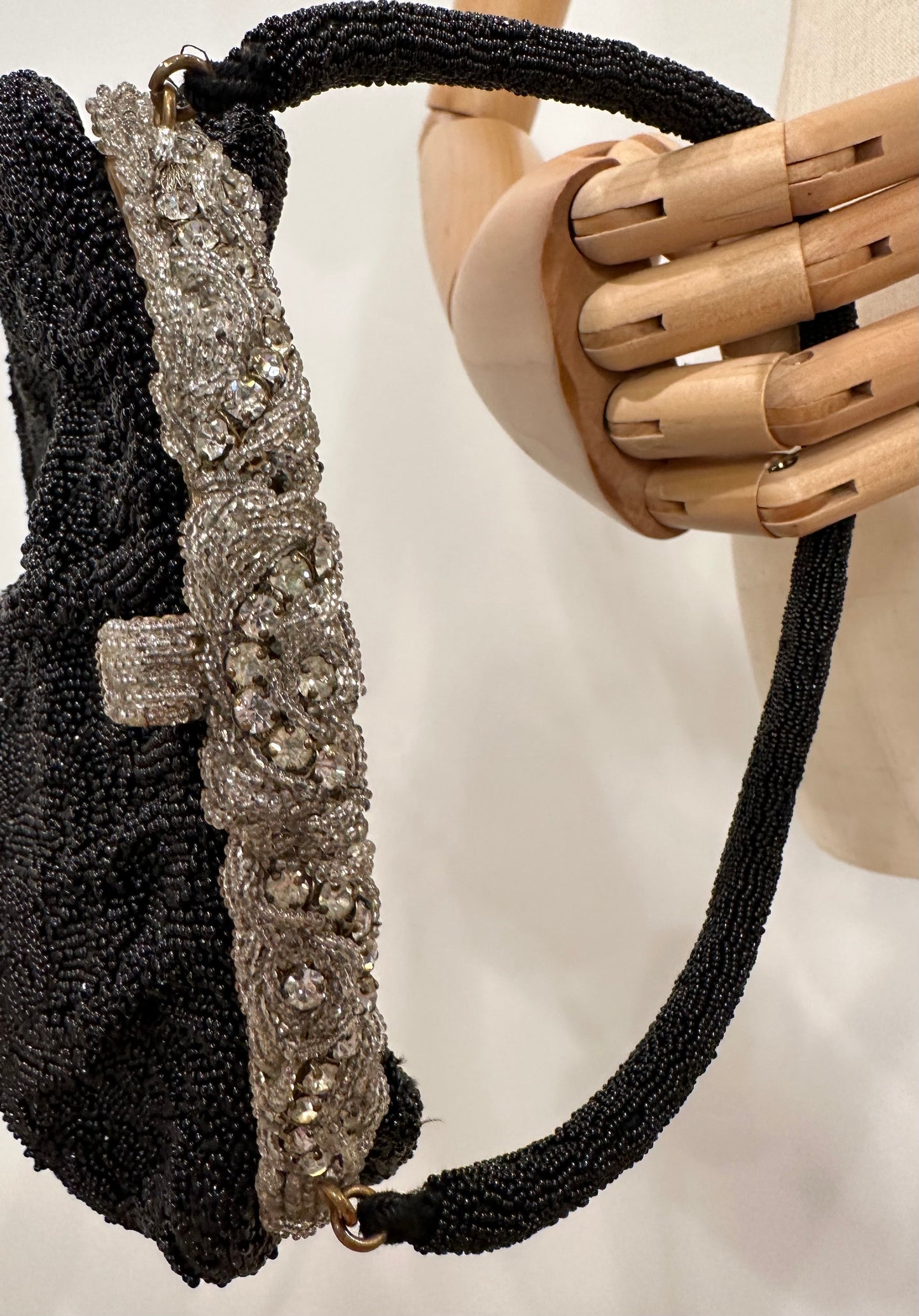 Le Gout du Jour Paris Black Beaded Handbag with Rhinestone Encrusted Enclosure.