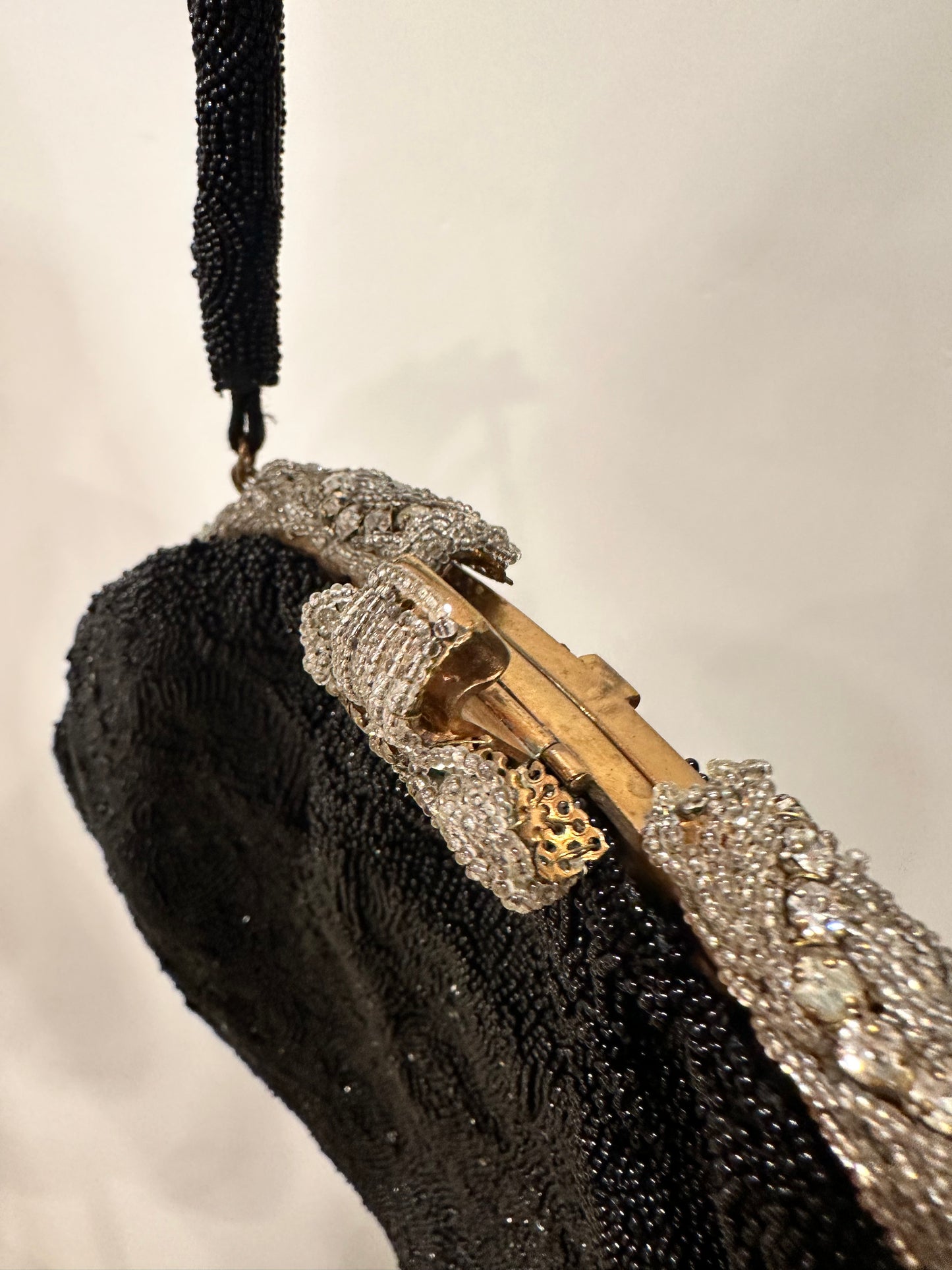 Le Gout du Jour Paris Black Beaded Handbag with Rhinestone Encrusted Enclosure.