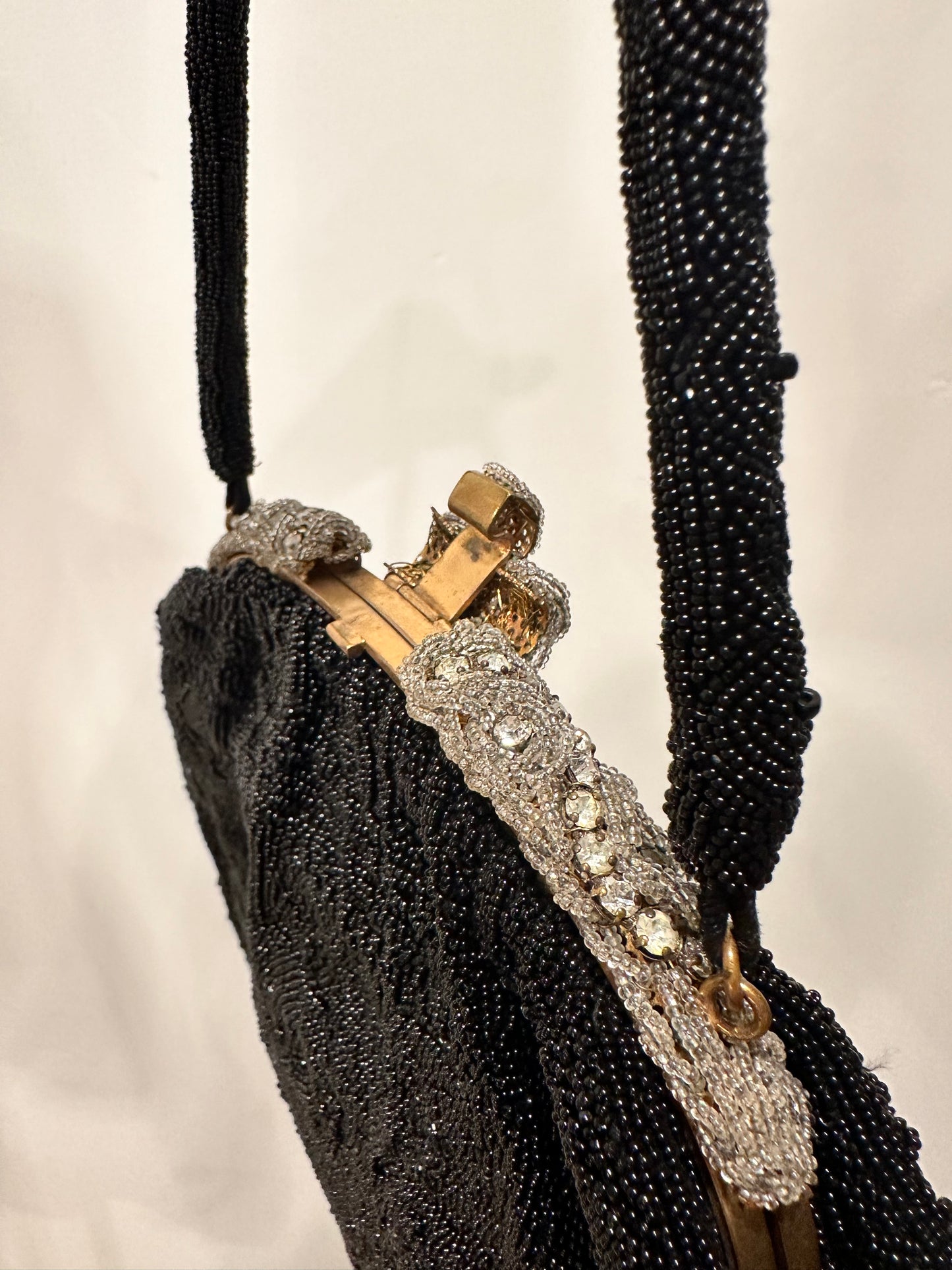 Le Gout du Jour Paris Black Beaded Handbag with Rhinestone Encrusted Enclosure.